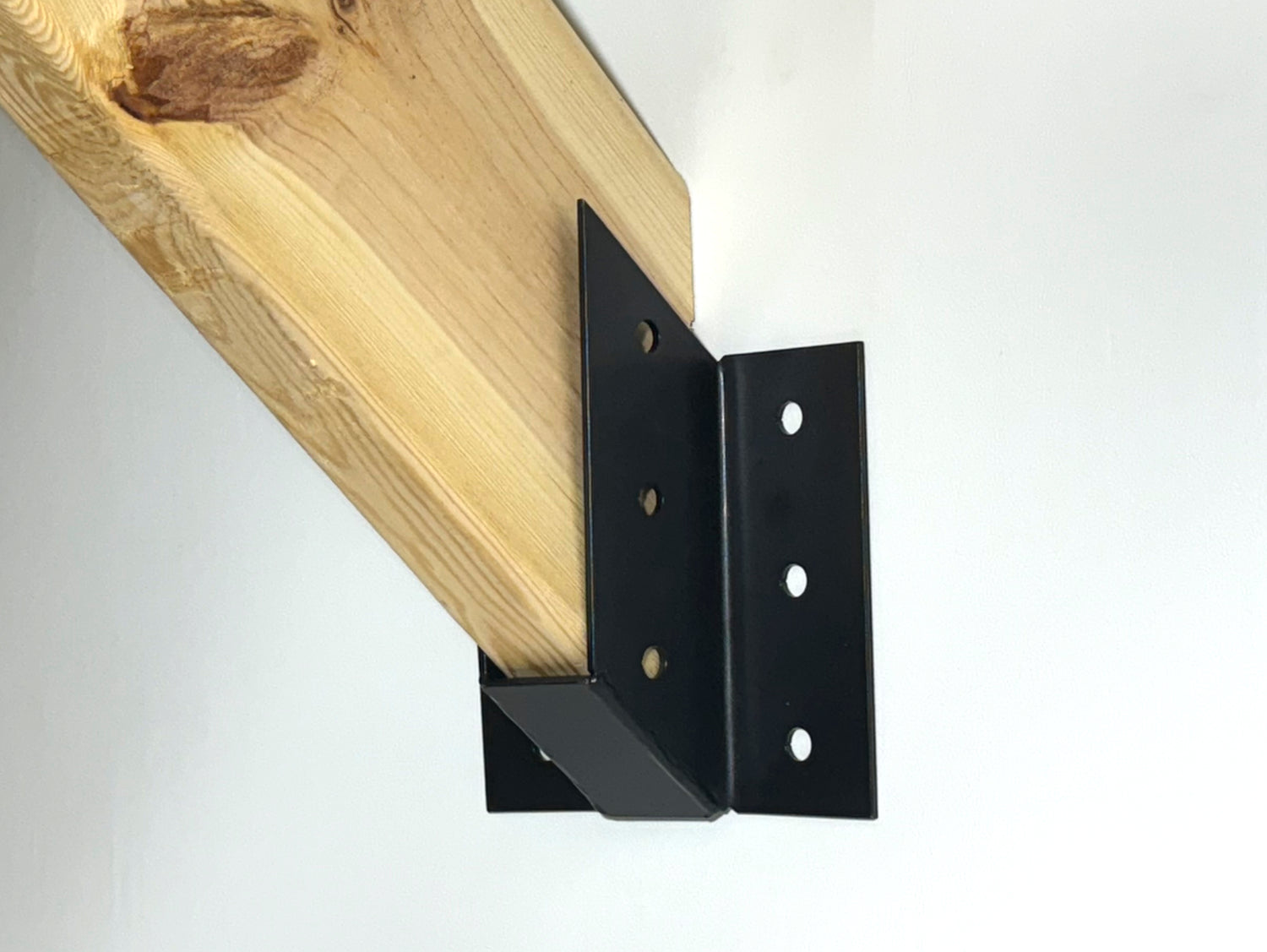 Saddle Truss Brackets - Up Angled - Wood Post Brackets - construction materials - building supposrts - beam supports - post support - timber frame brackets - wood frame buildings - post frame buildings - barndominium brackets - exposed beam brackets